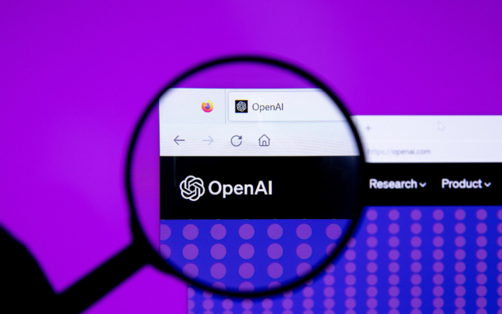 OpenAI logo with magnifying glass (52916339167)